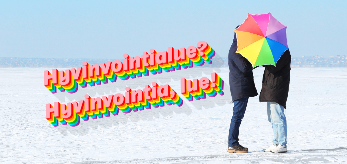 Kaksi talvivaatteissa olevaan henkilöä sateenkaarisateenvarjon alla keskellä jäätynyttä merta tai järveä