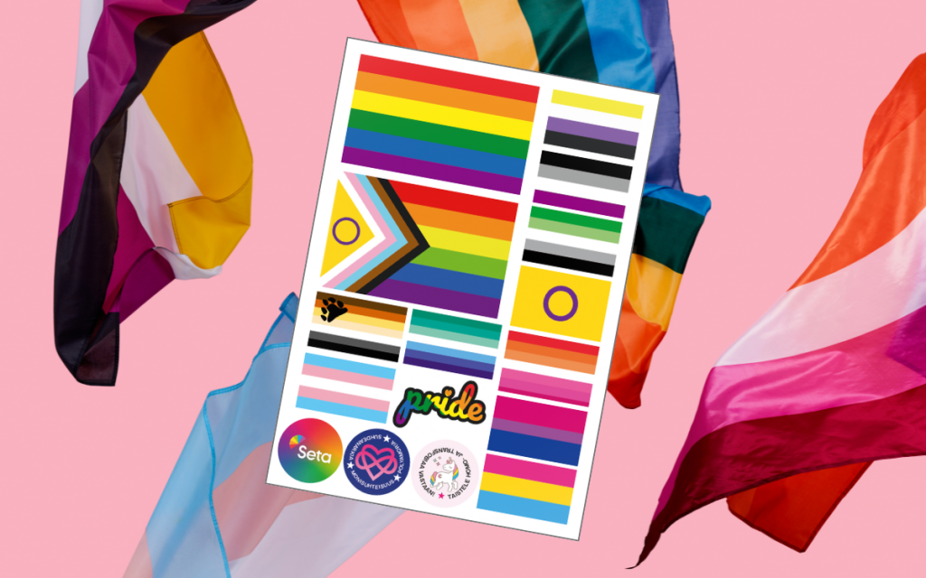 Sateenkaari-ihmisten tunnuksiin kuuluvia lippuja liehumassa sekä tarra-arkki, jossa samoja lippuja.